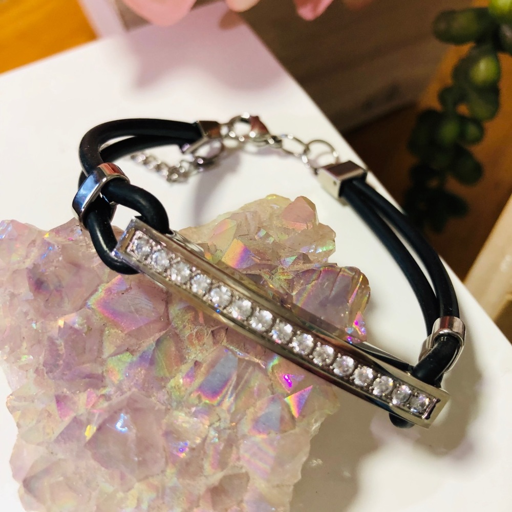 Silver, rhinestone, and black bracelet
